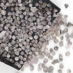 natural pink raw diamond with an unpolished rough surface for jewelry design