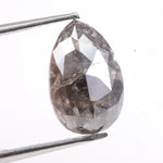 Natural diamonds displayed in various cuts and colors, showcasing real earth-mined gemstones formed over billions of years.