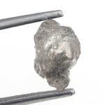 1.78 carat unpolished grey diamond with a natural rough surface for a real gold ring