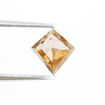 0.39 Ct kite cut brown grey natural diamond with sharp angles and modern luxury appeal