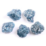 Rare deep blue diamond set in a custom ring, highlighting brilliance and luxury.