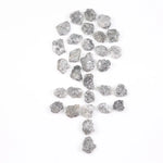 Raw gray silver diamond with shimmering steel-toned surface for custom jewelry