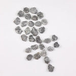 Raw gray silver diamond with shimmering steel-toned surface for custom jewelry