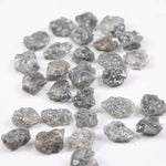 Raw gray silver diamond with shimmering steel-toned surface for custom jewelry