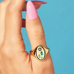 Unique Eye Motif Lab Grown Ring with Blue Teardrop Stones and Black Center in Yellow Gold, Artistic Design