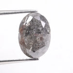 Nature diamond close-up image highlighting brilliance and internal inclusions. Genuine natural diamond showcasing authentic earth formation and unique beauty.