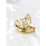 Vintage inspired Kira Kirby style engagement ring set with an oval champagne lab-grown diamond in 14k yellow gold