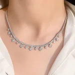 11.64 Ct Jade with gold necklace featuring green gemstone pendant.