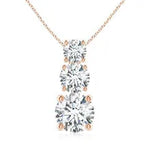 5.27 Ct Gold bow necklace pendant with ribbon-inspired design.