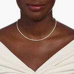 12.06 Ct gold cross necklace with polished finish.