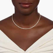 12.06 Ct gold cross necklace with polished finish.