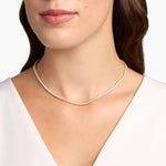 12.06 Ct gold cross necklace with polished finish.