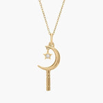 0.18 Ct with gold necklace featuring green gemstone pendant.