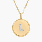 0.84 Ct Gold compass necklace pendant with engraved compass design.