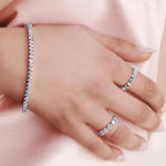 5.70 Ct Pear Cut White Gold Plated for women with round diamonds in white gold setting.