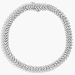 Round Cut Luxury tennis braclet with white diamonds and gold links.