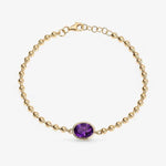 Diamond tennis bracelet for women in gold with round diamonds.