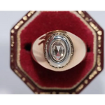 Elegant lab created gemstone ring with garnet red stone and sparkling diamond setting
