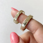 Infinity design couple rings symbolizing eternal love, crafted in sterling silver.