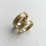 Infinity design couple rings symbolizing eternal love, crafted in sterling silver.