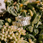 Dual-tone couple rings with modern geometric patterns for stylish partners.