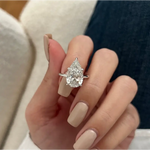 Elegant 5carat pear cut engagement ring with dazzling center stone