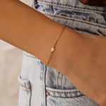 ruby tennis bracelet paired with diamond bracelets womens fashion jewelry and sparkling luxury finish.