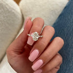 2 carat oval shape lab grown diamond ring with brilliant cut center stone in a classic engagement ring setting