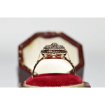 Unique lab grown diamond engagement ring with cushion cut stone in modern gold design