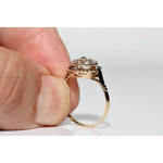Unique lab grown diamond engagement ring with cushion cut stone in modern gold design