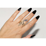 Stylish lab created gemstone ring with ruby red center stone and white diamond halo