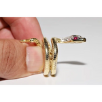 Stylish lab created gemstone ring with ruby red center stone and white diamond halo