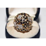 Elegant lab created gemstone ring with blue sapphire center and sparkling white diamonds