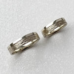 Minimalist sterling silver couple ring set, sleek design ideal for modern partners.