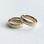 Matching platinum couple rings, timeless design for a perfect symbol of love.