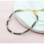 gold bracelet with beads and gold snake bracelet inspired by uncut stones and value collections.