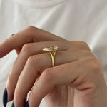 Stunning 2 ct pear shaped diamond ring with elongated design and intense fire