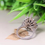 Art Deco style sterling silver pear shaped black onyx ring with blue topaz halo, cocktail statement ring, unique engagement gift