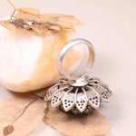 Georgian style aquamarine round cut floral ring in sterling silver with pink gemstone sunflower accents, vintage cluster jewelry