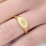Gold initial signet ring for women with dainty personalized alphabet and minimal modern design