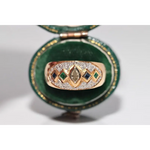 Luxury lab created gemstone ring with emerald cut green stone and diamond accents