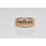 Luxury lab created gemstone ring with emerald cut green stone and diamond accents