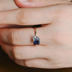 2.03 Ct MOI lab created oval diamond ring, sleek gold band, sophisticated luxury jewelry.