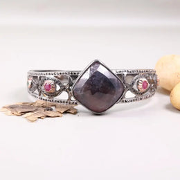 1990s vintage sterling silver bracelet with square purple gemstone, natural diamonds, and black diamond cuff antique jewelry