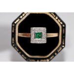 Stylish lab created gemstone ring with ruby red center stone and white diamond halo