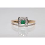 Stylish lab created gemstone ring with ruby red center stone and white diamond halo