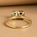 2.03 Ct MOI lab created oval diamond ring, sleek gold band, sophisticated luxury jewelry.