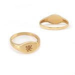 Personalized gold alphabet ring for women featuring dainty initial design in a modern signet style