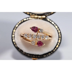 legant lab created gemstone ring with garnet red stone and sparkling diamond setting