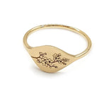 Beautiful dainty gold initial ring with engraved alphabet in elegant signet ring style